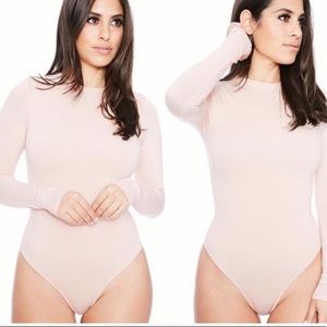 Naked Wardrobe-light pink bodysuit. Small size.